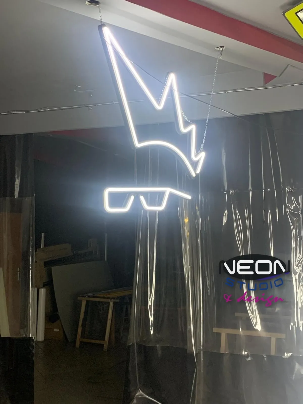 LED neon with a lightning bolt and glasses motif – indoor installation