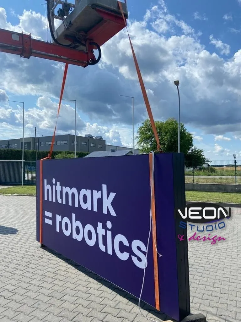 Installing a large lightbox at height