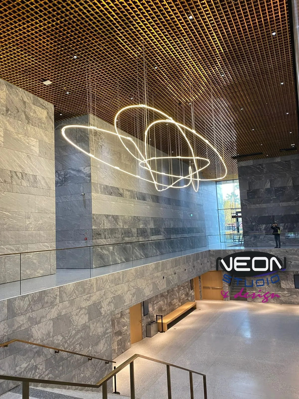 Museum of Polish History — neon orbits: a suspended installation in white neon light above the museum hall